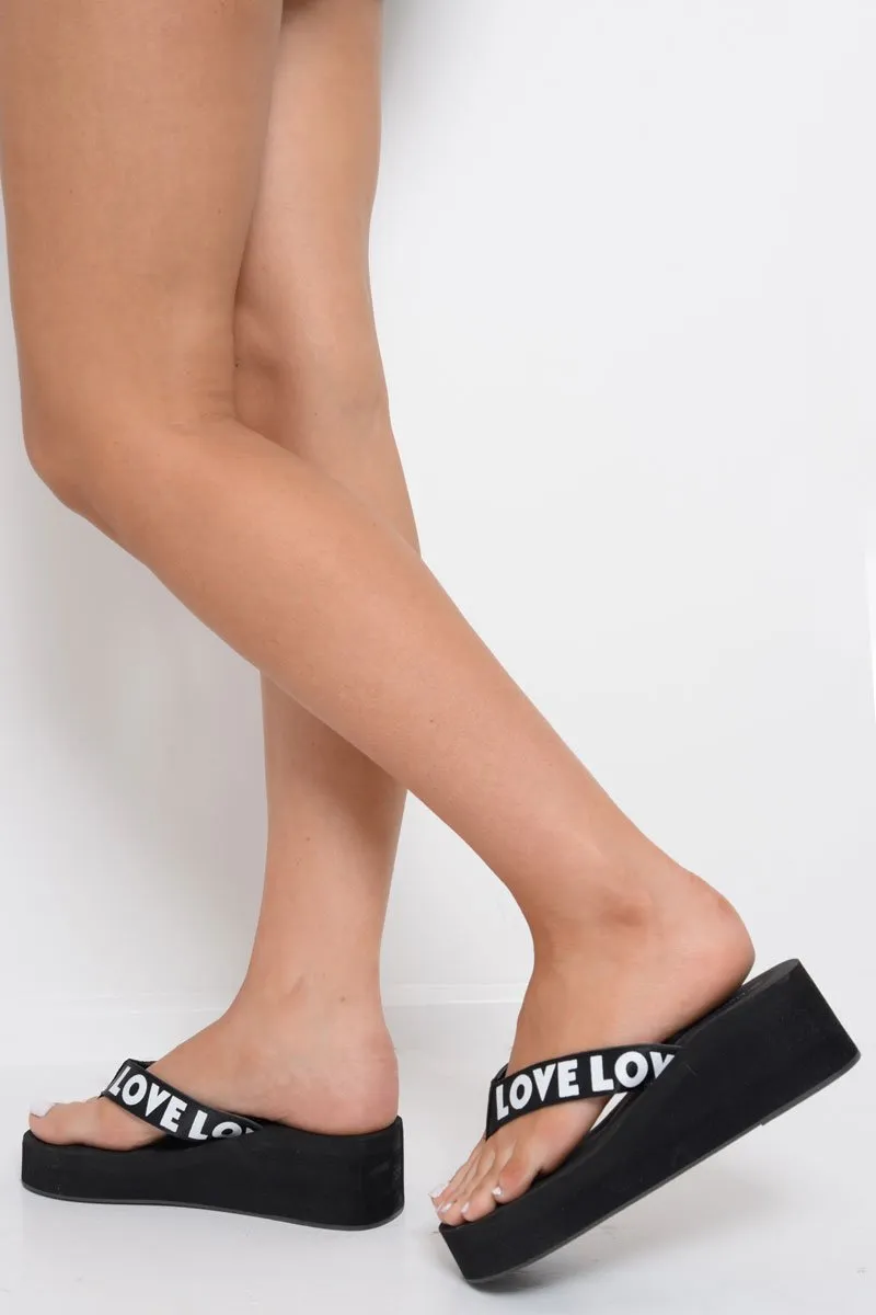 Black Slogan tape Platform Flip Flops - Zyriana